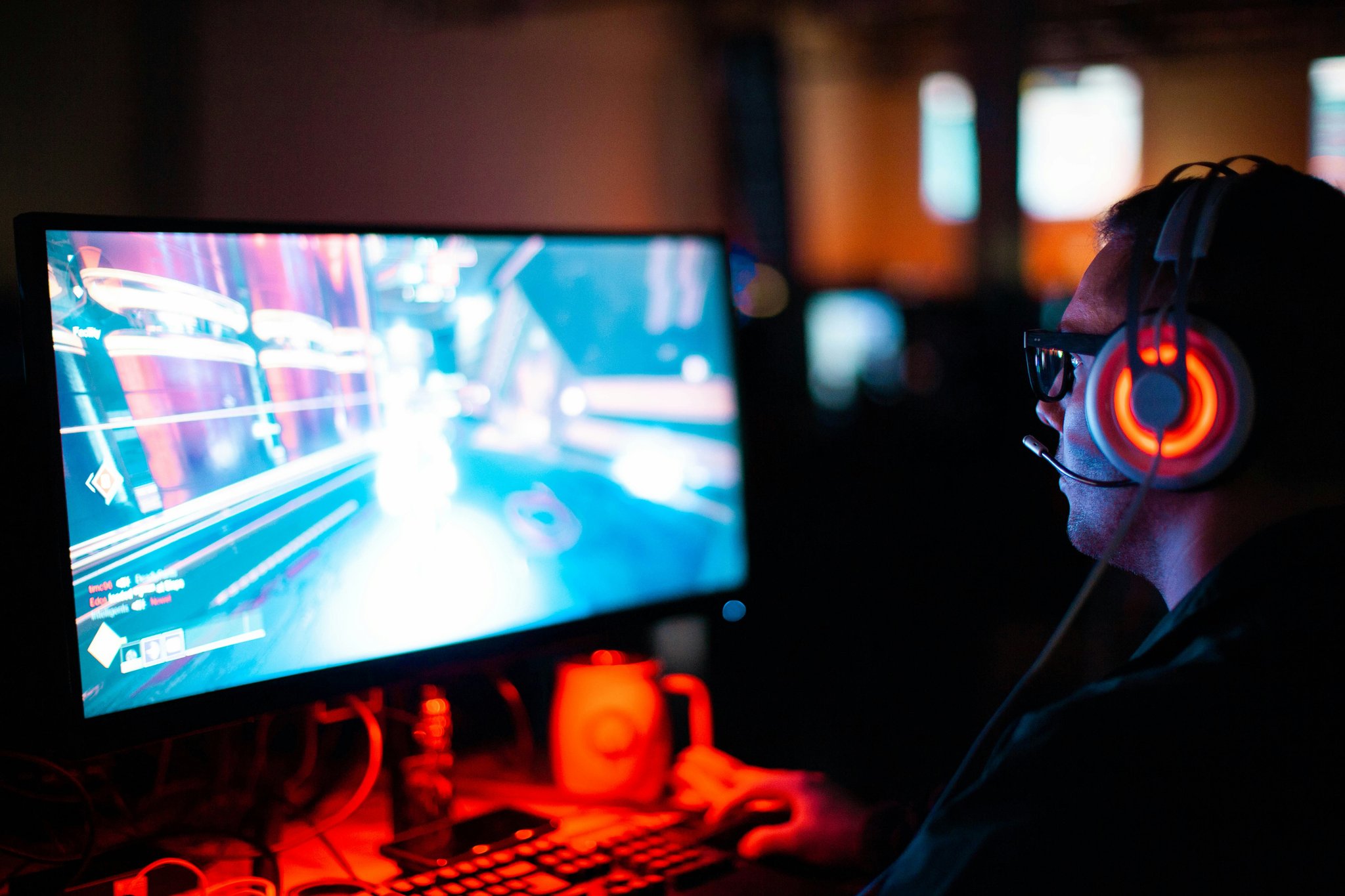 Gamer analyzing stats on tablet screen