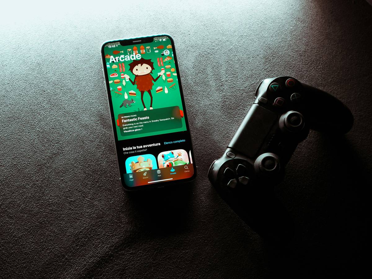 A gamer celebrating after winning a virtual tournament