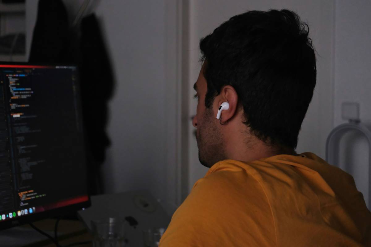 A sleek black gaming tablet running a popular MMO game with vibrant graphics and intuitive controls.